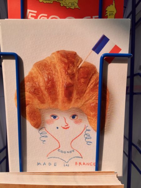 postcard with croissant head Bring France Home