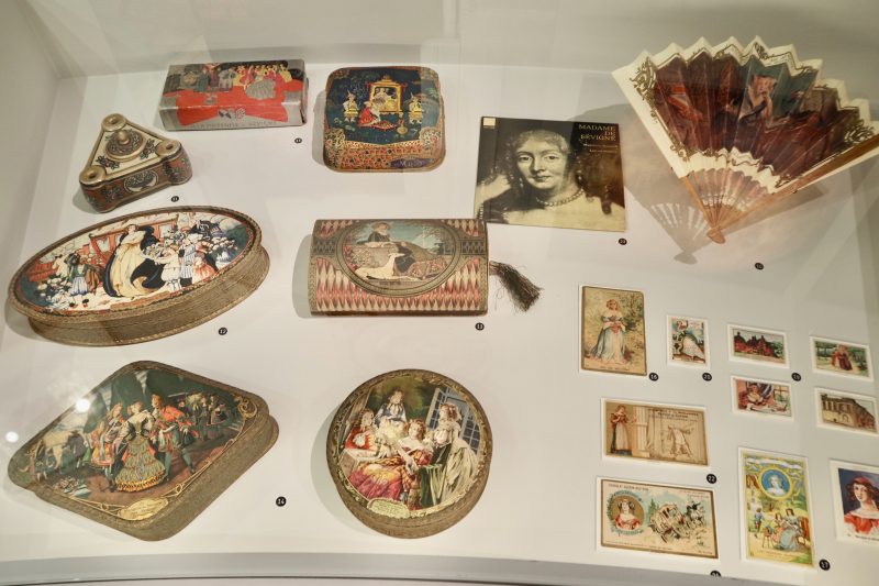 Assorted images and objects using the name of Madame de Sévigné for products, playing cards, post cards, chocolates, ink wells, biscuits, etc. exhibition Madame de Sévigné Lettres parisiennes Parisian Letters Musée Histoire de Paris Carnavalet www.colleensparis.com